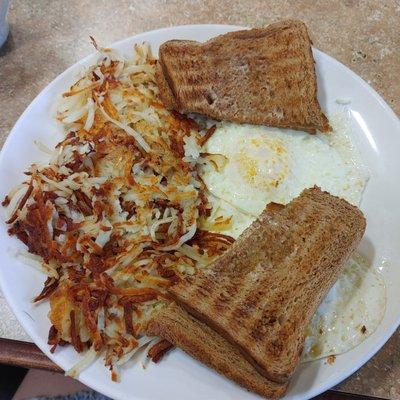 Hash browns, wheat toast, eggs over medium