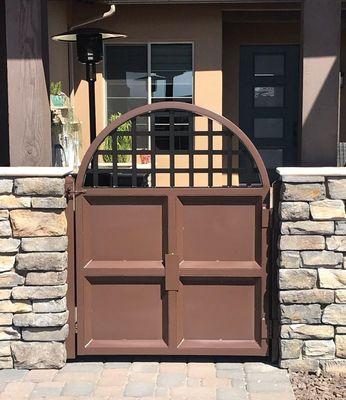 A custom arched walk gate we just installed