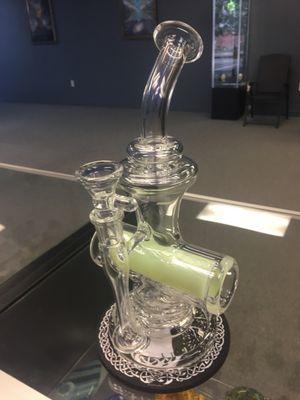 This glow in the dark water pipe is just one of many "one of a kind" pieces that we carry