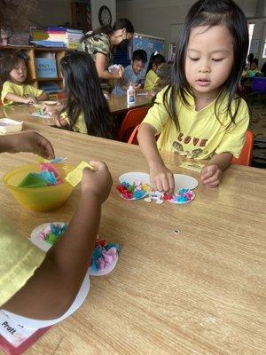 Developing our fine motor skills with springtime class activities.