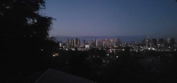 View of Waikīkī at sunrise from the Davies room.