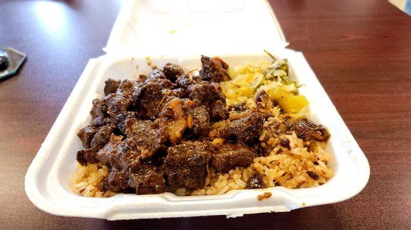 Stew Beef over Rice & Peas