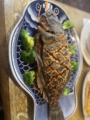 Very overcooked whole Flounder, the broccoli around it was tasteless