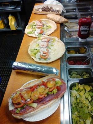 italian sub, couple of greek wraps waiting for chicken,