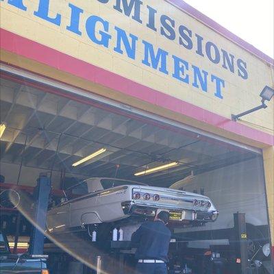 Ignacio and his team at CUSTOM MUFFLERS & BRAKES installing exhaust hangers on my 1962 impala