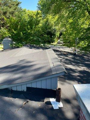 Top edge of window with different roofing  material after they ran out of the one used for rest of roof.