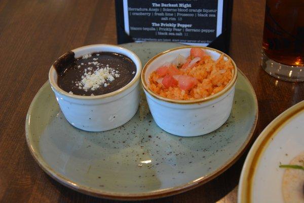 Black Bean on Left and Mexican Rice with Tomato Garnish on Right