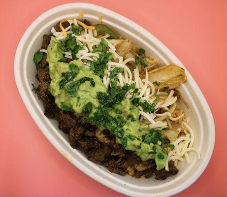 Steak burrito bowl with guacamole