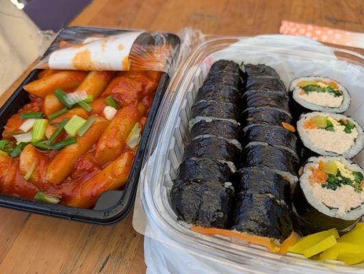 Tuna kimbap, next to dukbokki from the market