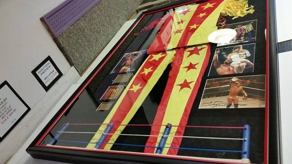 Creme' da la creme' Randy Macho Man Savages signed uniform and photos. Hand built wrestling ring with and access door.