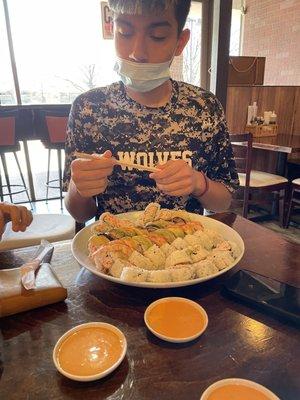 My son enjoying a plate of sushi at Edohana!