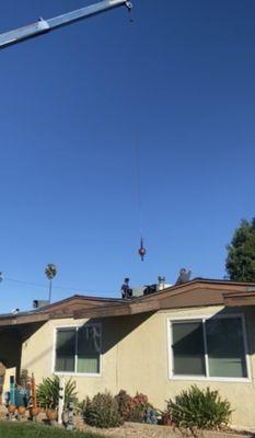 Edgar and Chris taking down our old AC unit!