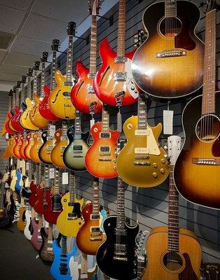 Gibsons and Rickenbackers, plus others. Acoustics and electrics.