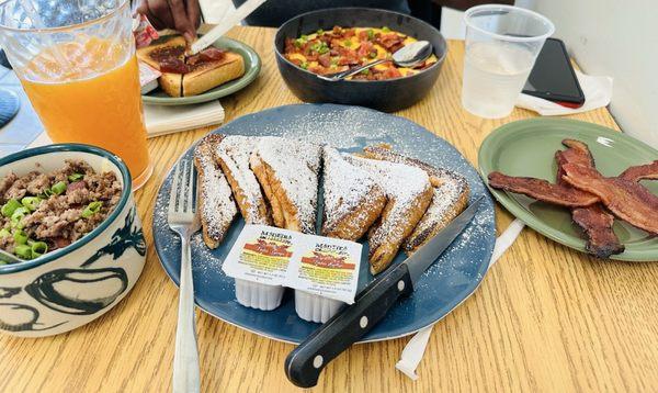 French toast, bacon, and loaded grits