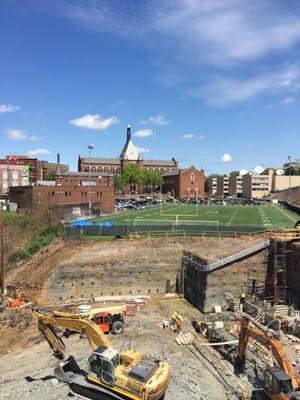 View of the pit being dug for new CMU business school,  CC football field (where Dan Marino and Mark Bulger played) and CC high school.