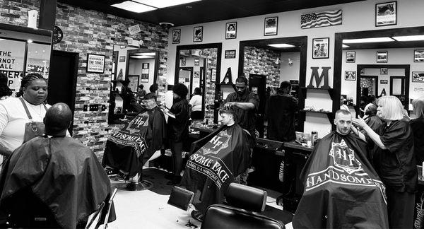 The Barbers at work.