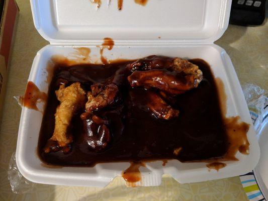 Are you kidding with this? How much effort is it to actually toss the chicken wings in the sauce? Practically inedible.  Get it together.