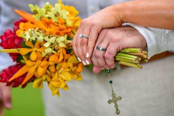 Our bands on wedding day.  My husband also got his tungsten ring from KG