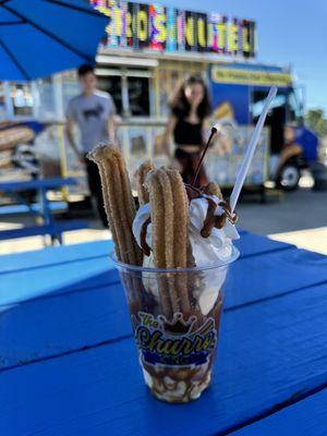 The Sugar Daddy. Churros with vanilla ice cream, caramel, chocolate syrup, whipped cream and a cherry on top.