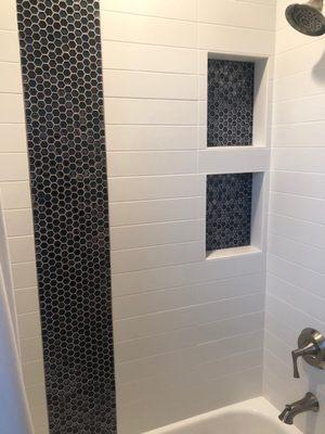 The tile job for the shower is a amazing.  Another great job.