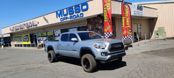 2017 TRD off-road with a 2.5 front lift and 1.5 inch real lift along with new wheels!