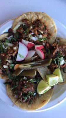 Steak and al pastor tacos.