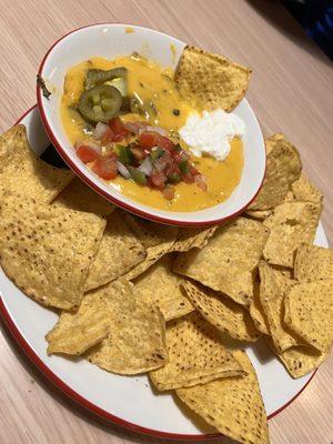 Store bought chips and their "queso".