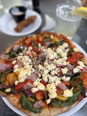 My roasted veggie flatbread (heaped with veggies and goat cheese -- it wasn't really flat)