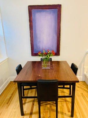 A 4' x 4' x 1  1/2" walnut slab that Eco Friendly made for our custom dining room table.