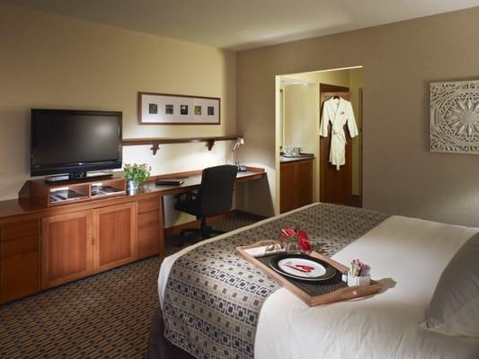 Guest room amenities include executive work areas, a coffee maker, pillow-top mattresses, luxurious bathrobes, and much more!