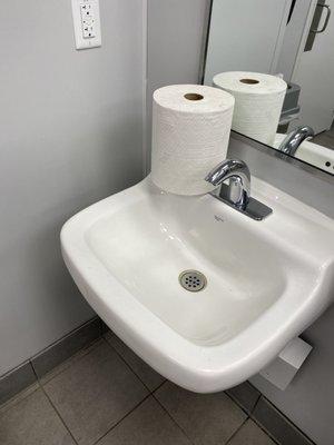 Bathroom sink and towels