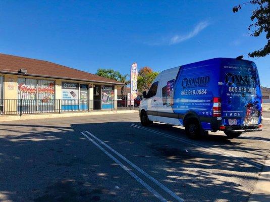 The outside of our repair shoo and our repair van !