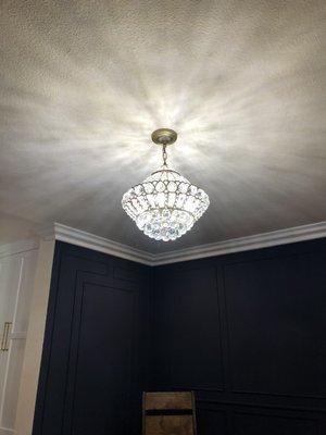 He ran new electrical and installed this chandelier.