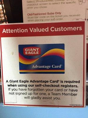 The definition of assistance from a team member, when you do not have an Advantage card, is to tell you that you cannot use the register.