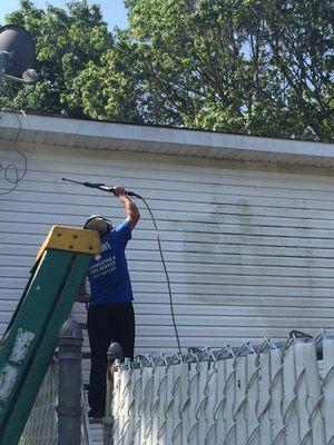 Pressure washing a house in Suffolk