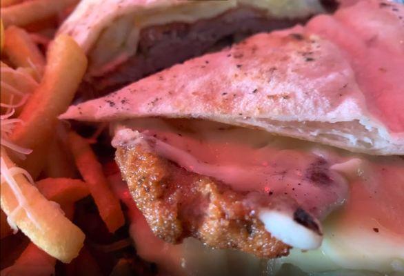 Breaded porchetta sandwich closeup