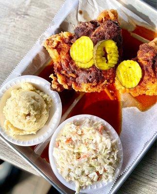 Nashville Hot double fried chicken w/ cole slaw & potato salad