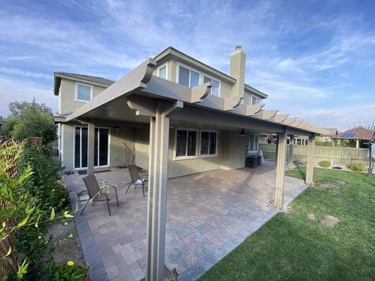 Solid Aluminum patio cover with Corbel ends.