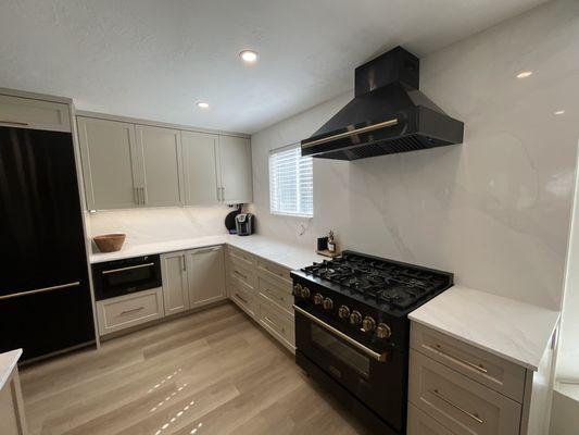 Newly renovated kitchen in Utah with a new stove and hood.