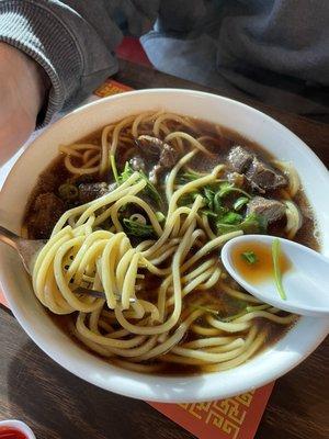 Chinese style beef noodle soup. Broth is delicious and meat is tender!