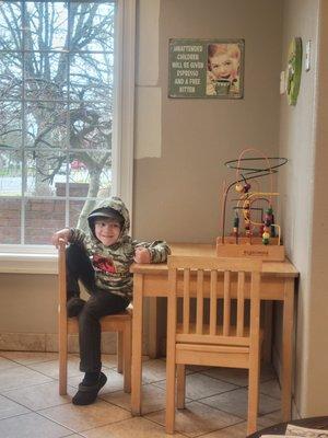 My son in the children's area to play, while we were waiting to be called back.