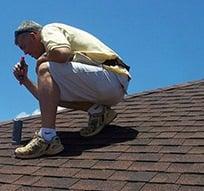 Fake photo: notice the lack of SWEAT. Roofers aren't up there to LOOK pretty, ya know?