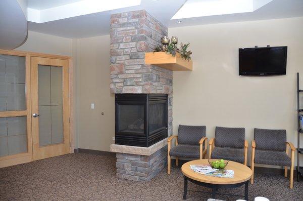 Cozy up next to our fireplace while you wait for our caring staff and dentists to help you with your dental care needs in Lakewood, CO.