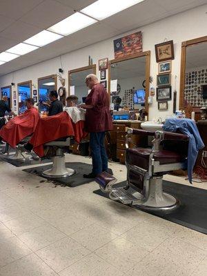 My son and one of the barbers.