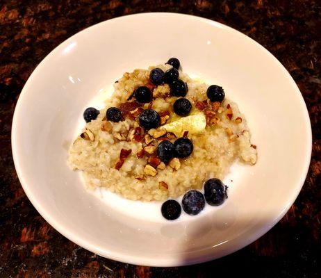 Yummy oatmeal with fruit and granola toppings!