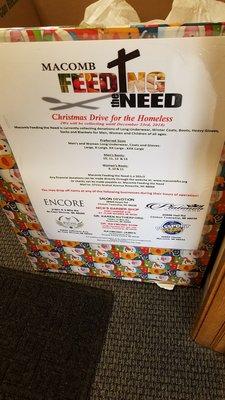 This Christmas "Feed The Warmth Donation" box is located when entering Dr. Linda Holland's office of Chiropractor