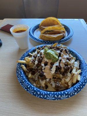 Super fries w/ carne asada & Quesabirra tacos