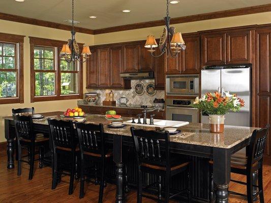 Remodeled Kitchen designed to accommodate the gourmet cook and family gatherings using Madison MP Venetian Bronze and Milan cabinetry.