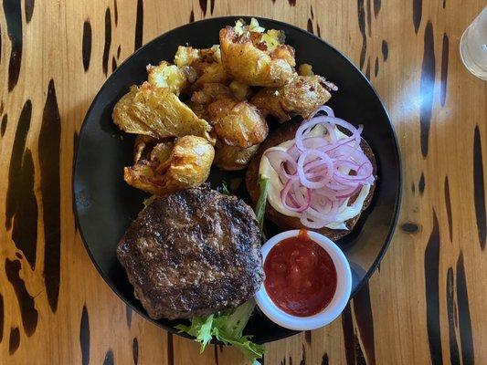 Wagyu burger with smashed potatoes