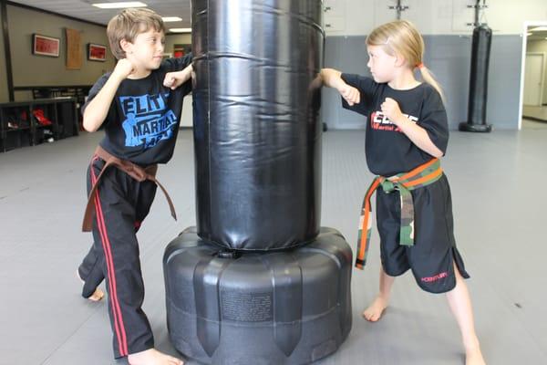 Elite Martial Arts makes learning how to defend yourself fun with Muay Thai kickboxing drills